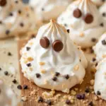 ghost meringue cookies with chocolate chip eyes - featured image