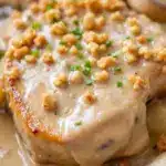 creamy crockpot pork chops with mushroom sauce - featured image
